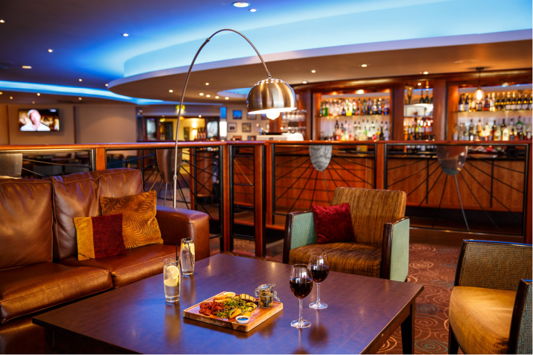 A hospitality venue with a welcoming bar and lounge